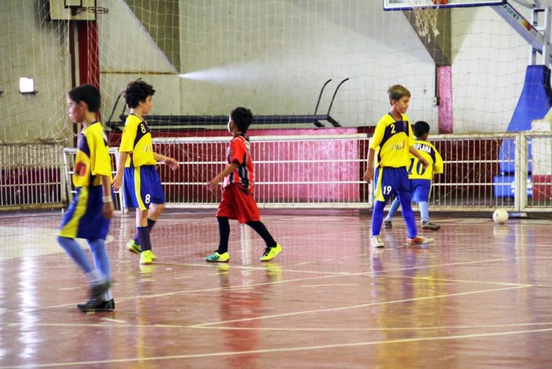 Lance de partida da última rodada do Campeonato Aberto de Futsal Menor